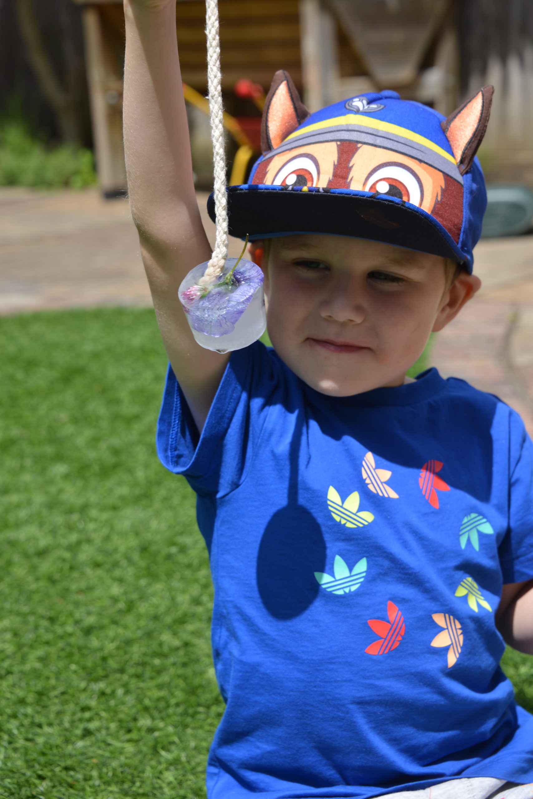 child holding some spring themed ice decorations