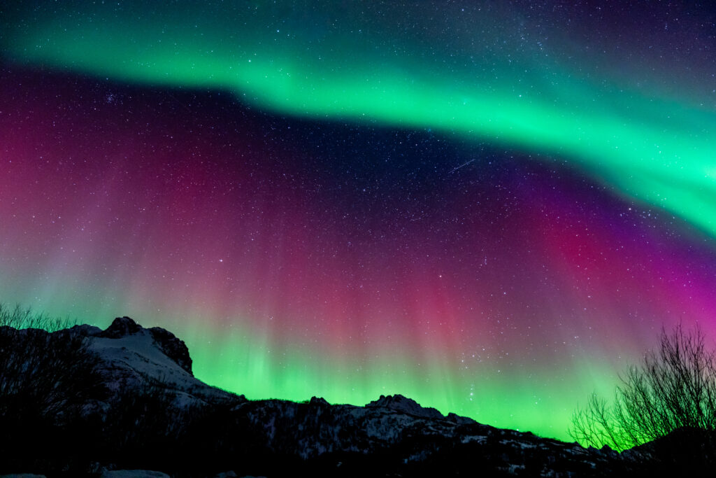 Northern Lights over mountains in Norway